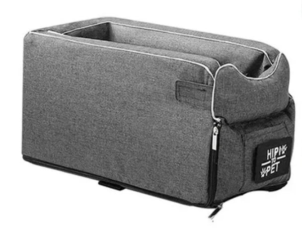 The Road Nest portable dog car seat in grey, shown from the side