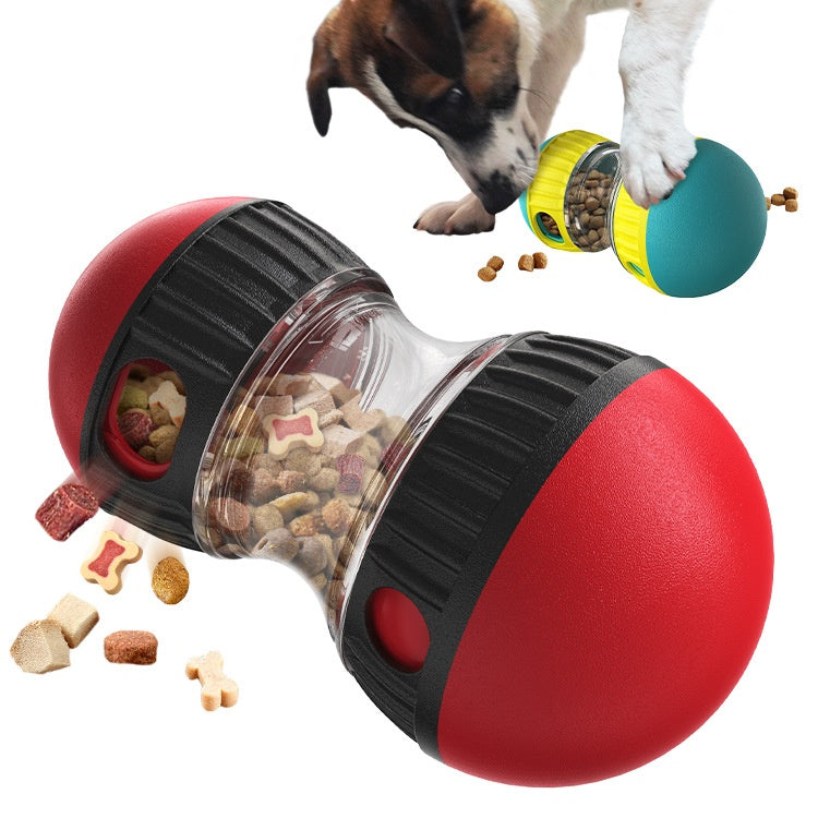 The Field Tumbler in red and teal, tipped over with kibble spilling out
