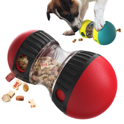 The Field Tumbler in red and teal, tipped over with kibble spilling out