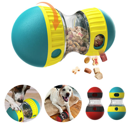 The Field Tumbler in teal and yellow with kibble falling from the opening