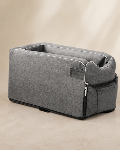 Grey portable dog car seat side detail showing fabric, piping and zippered pocket