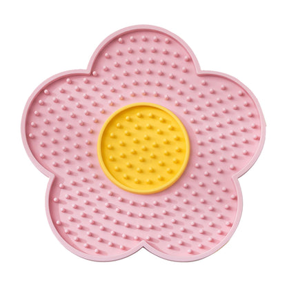 The Calm Lick Mat suction slow feeder in pink, flower shaped