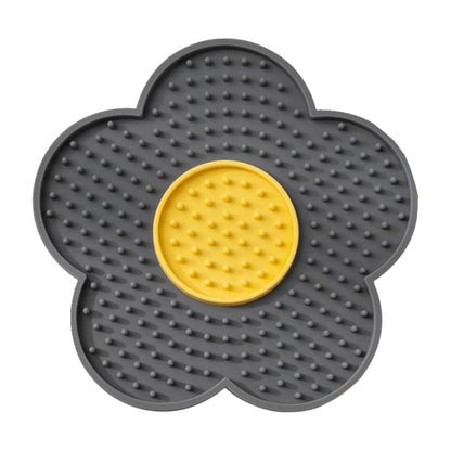 The Calm Lick Mat suction slow feeder in charcoal, flower shaped