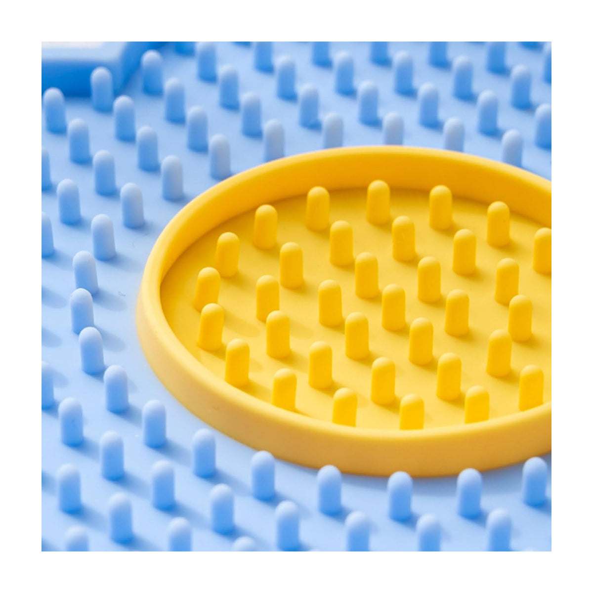 Close-up of the textured surface and central well of The Calm Lick Mat