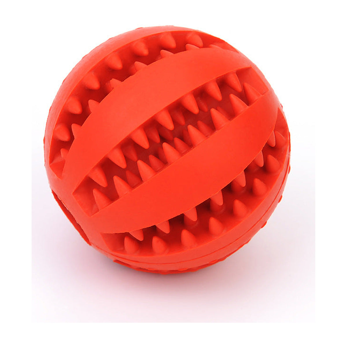 The Mint Treat Ball in teal beside scattered kibble, showing the grooves