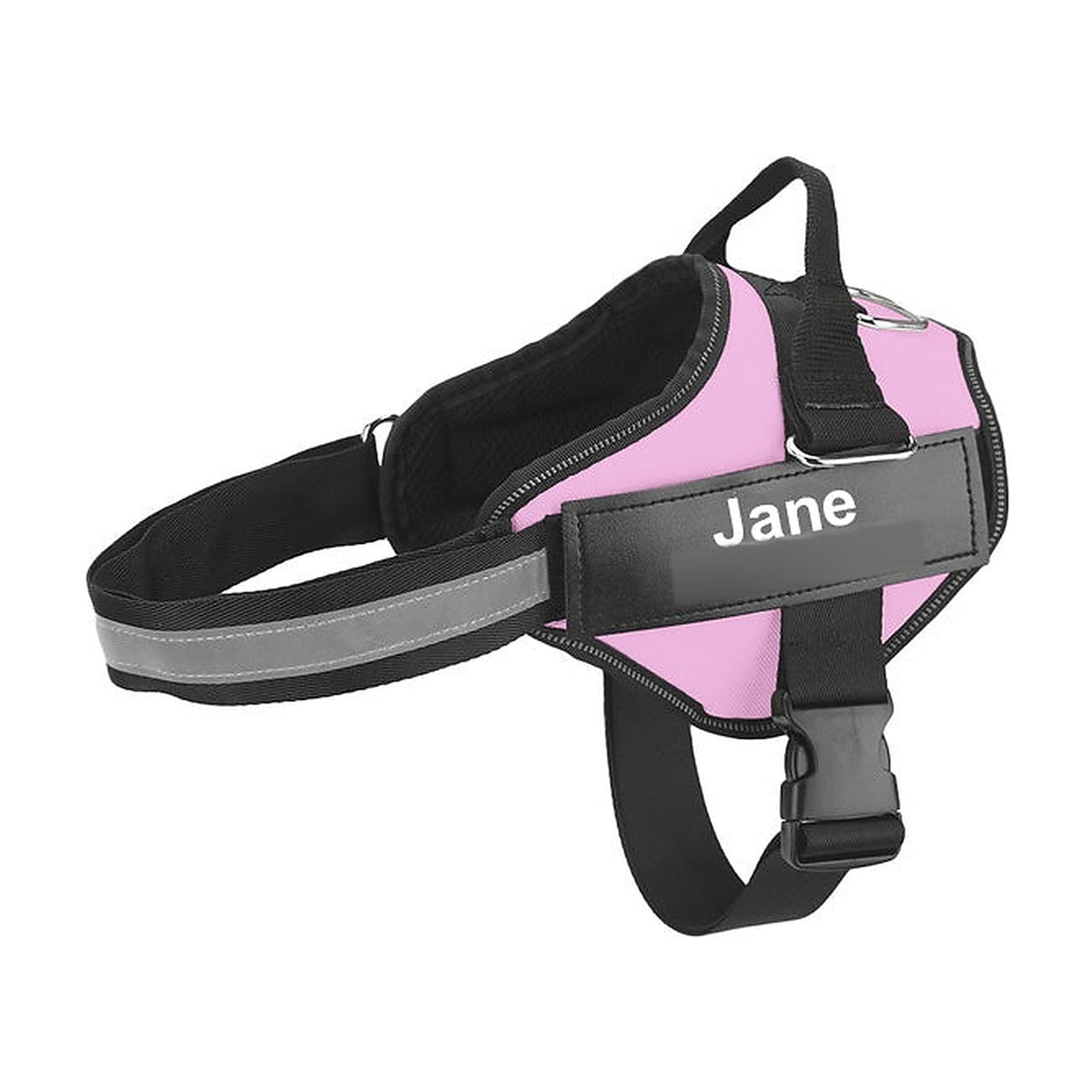 The Nameplate Harness in pale pink, with the engraved nameplate on the chest panel
