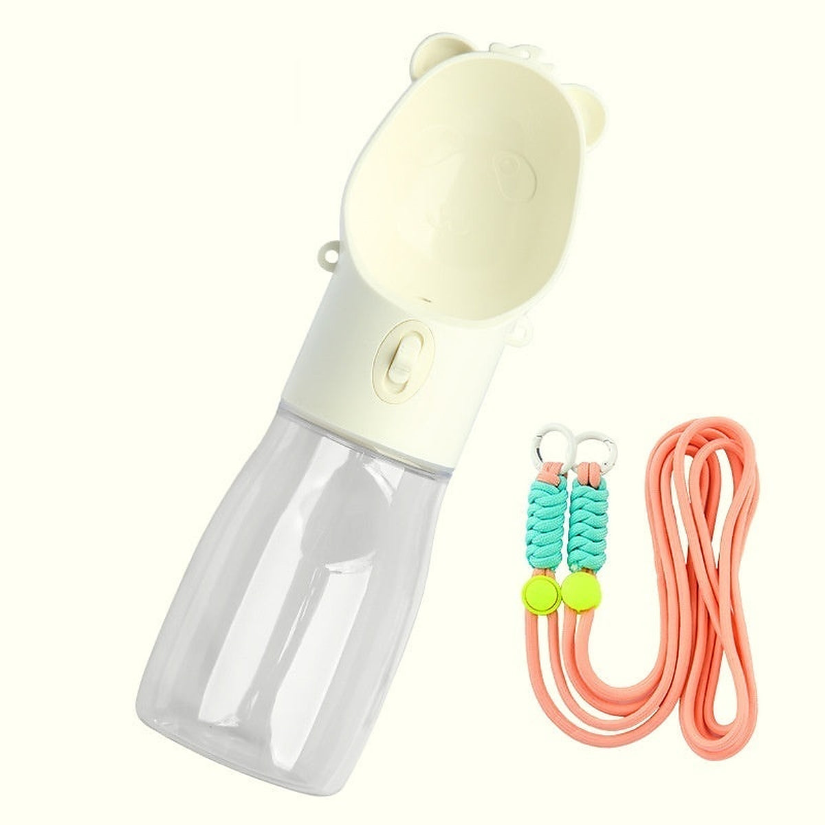 The Rover Bottle in cream with a coral carry strap
