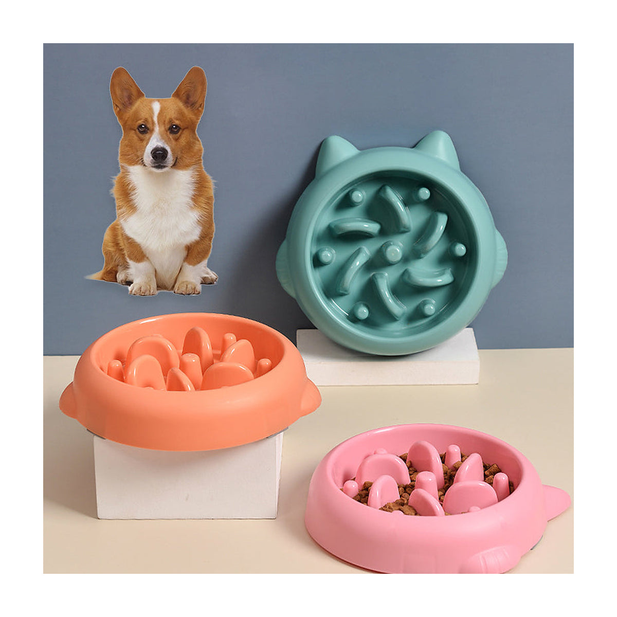 The Slow Bowl calm-mealtime feeder in teal, filled with kibble