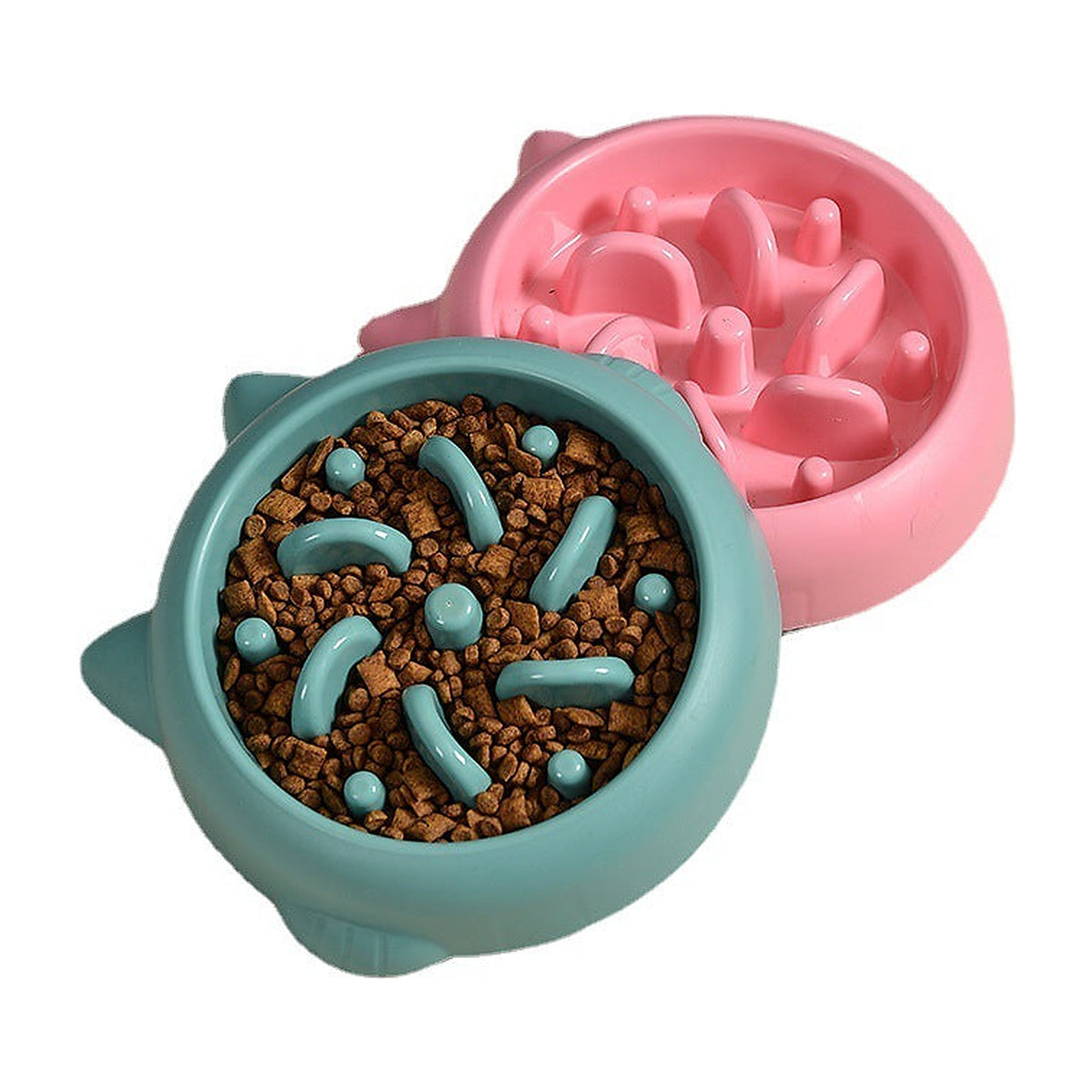 The Slow Bowl calm-mealtime feeder in coral, seen from above