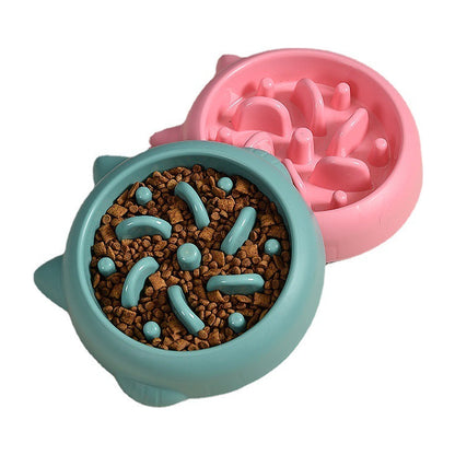The Slow Bowl calm-mealtime feeder in coral, seen from above