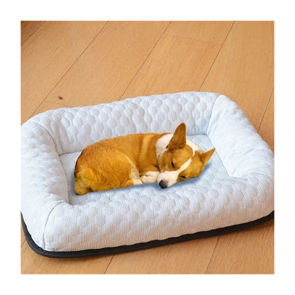 A corgi asleep on The Summer Rest Mat breathable cooling bed