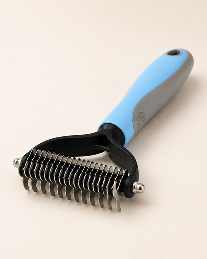 Blue Undercoat Rake close-up showing the two rows of rounded metal teeth