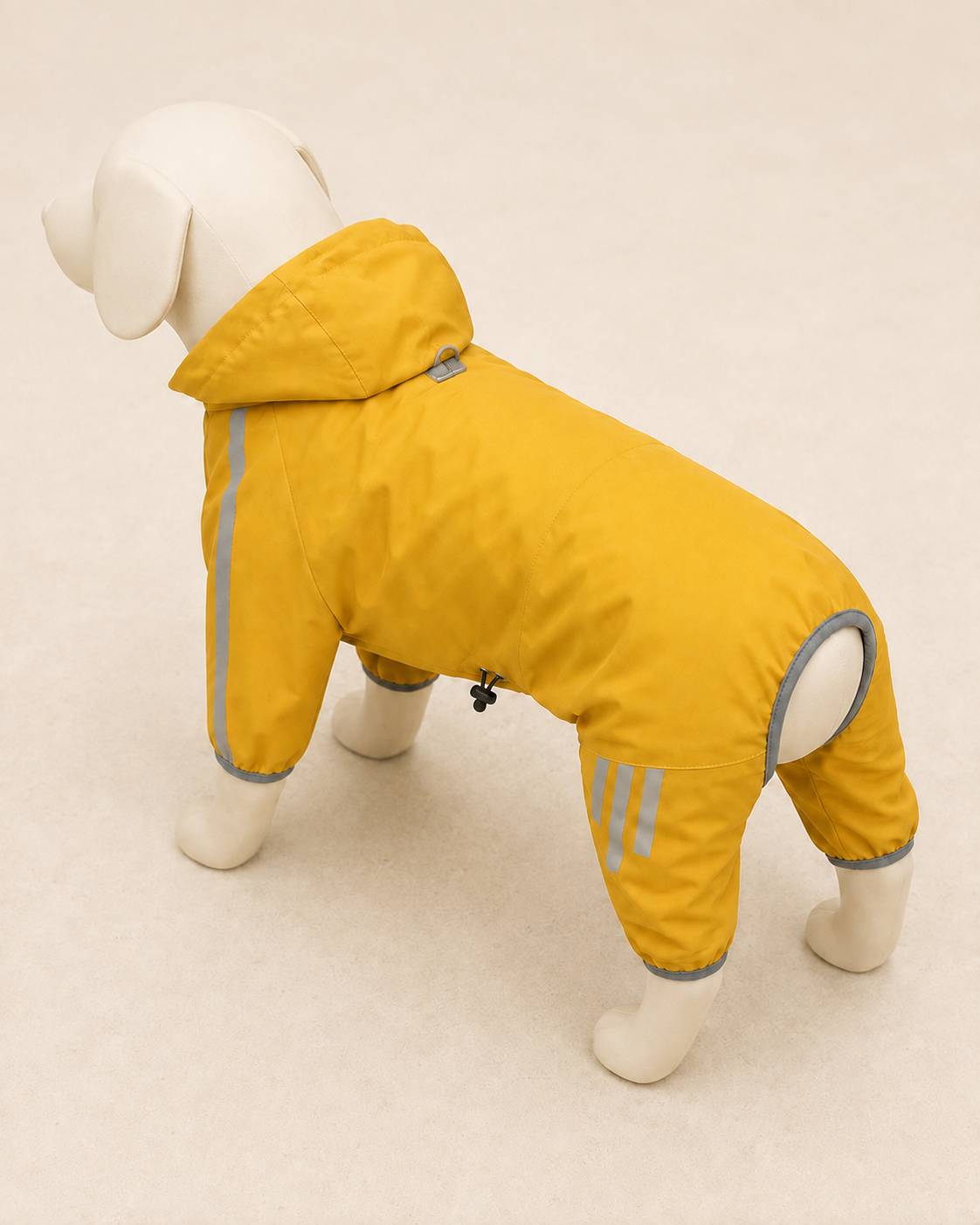 Yellow Weather Shell on a neutral dog mannequin from the back showing reflective trims and lead access
